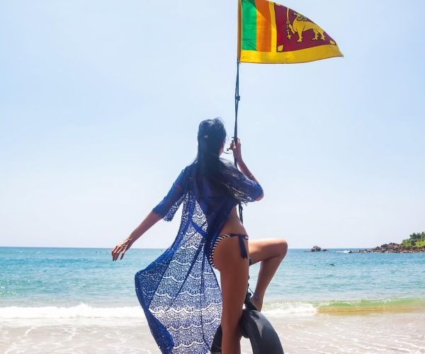 rear-view-woman-in-blue-swimwear-swing-on-bungee-w-2025-03-18-16-15-50-utc