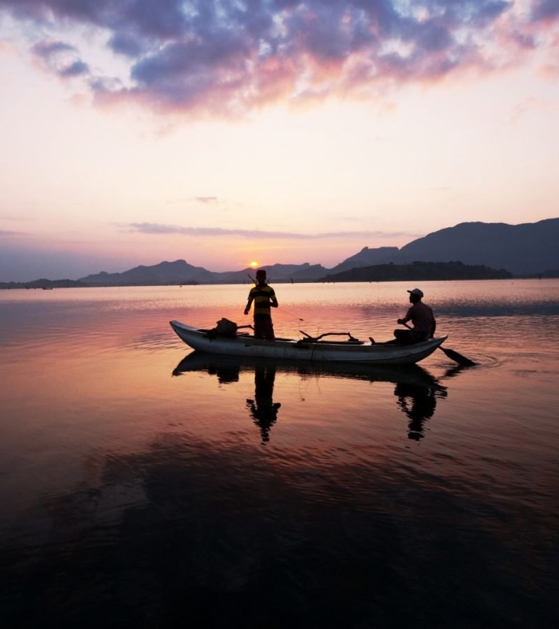 sunset-fishing-boat-on-lake-sri-lanka