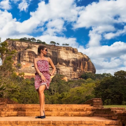 young-woman-in-sunglasses-posing-in-front-sigiriya-2025-03-18-16-29-49-utc
